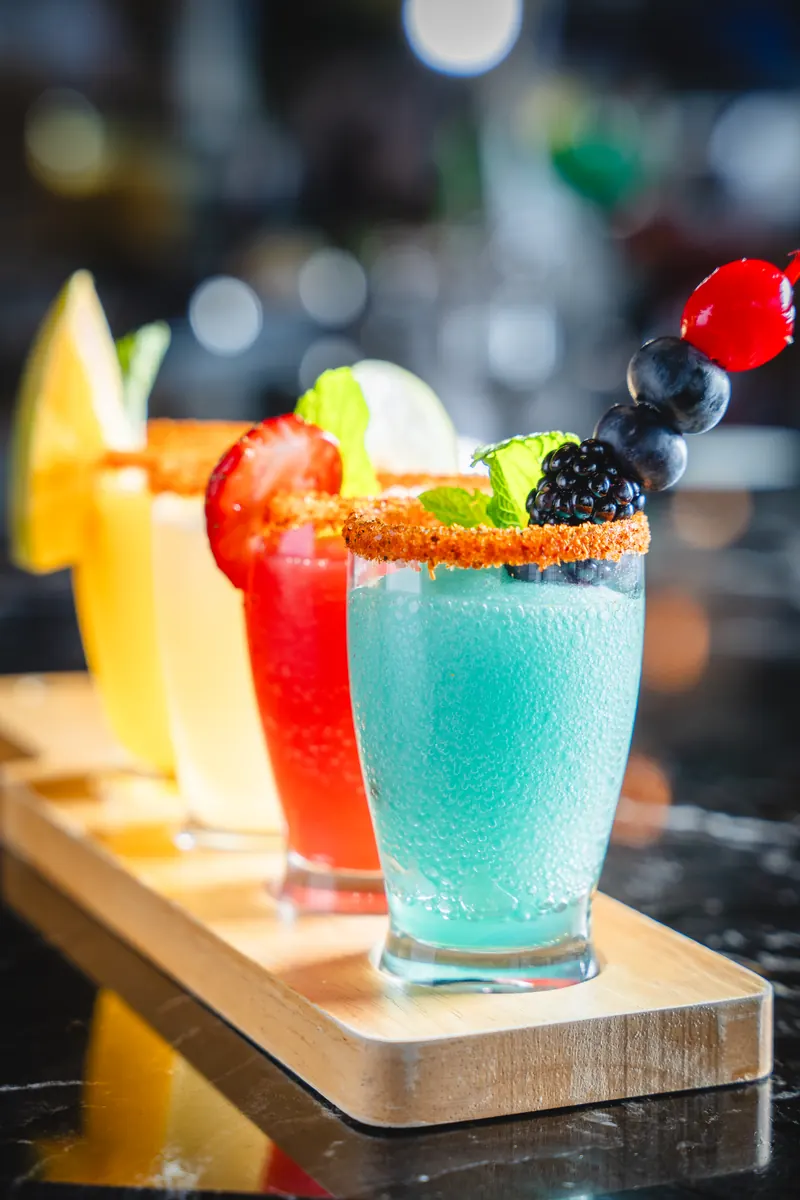 A flight of margaritas in four colours